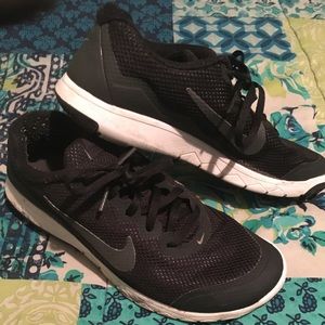 Worn Black Nikes Running Shoes